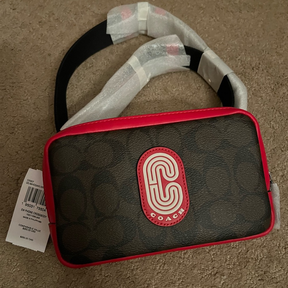 Coach Carrier Phone Crossbody In Colorblock Signature Canvas With Coach Patch.